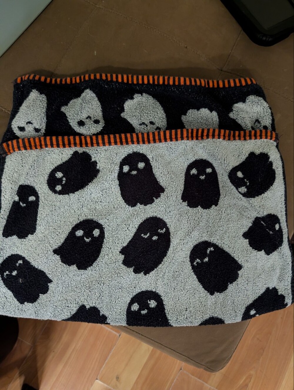 Ghost Print Hooded Towel Poncho - Black & White with Orange Trim. Comes With 2